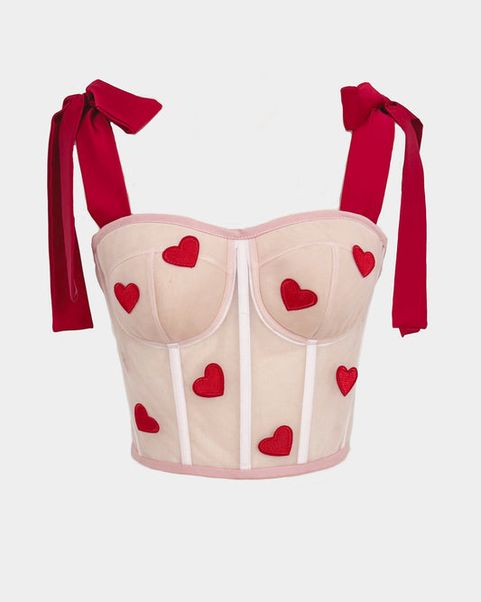 A WOMAN WITH RED HEARTS CORSET