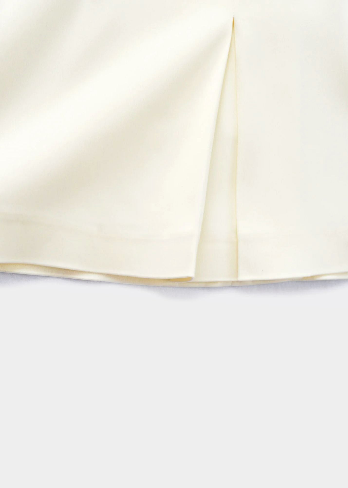 SINGLE PLEAT SATINATED MINI SKIRT